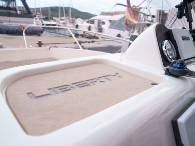 Premium synthetic teak boat decking on a Quicksilver motorboat